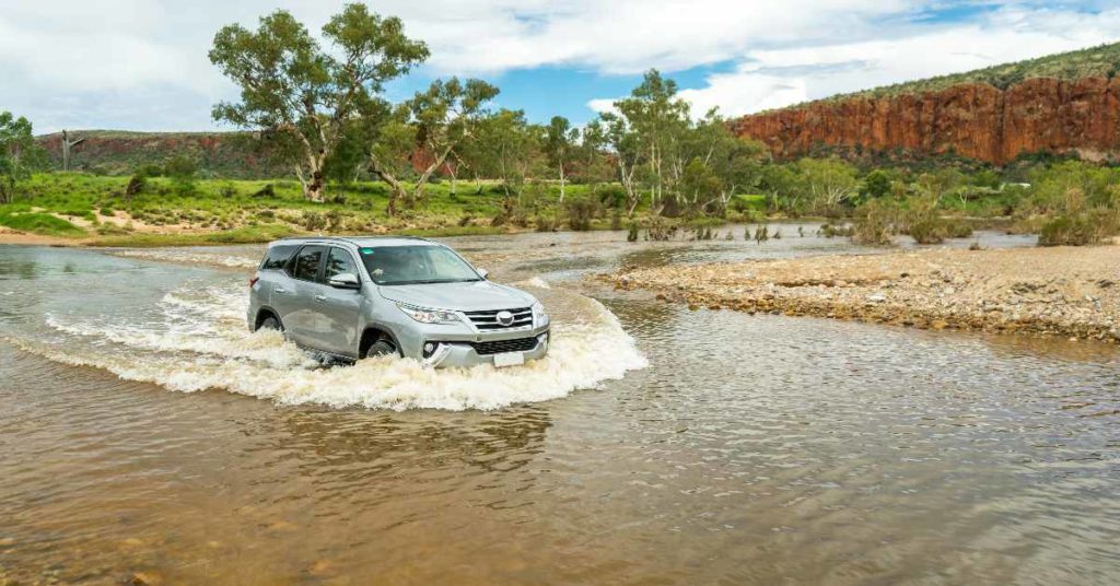 4WD wades through deep water 