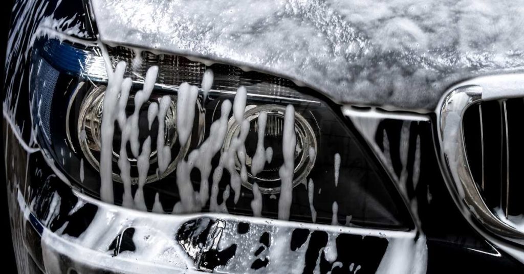 close-up of black car getting washed